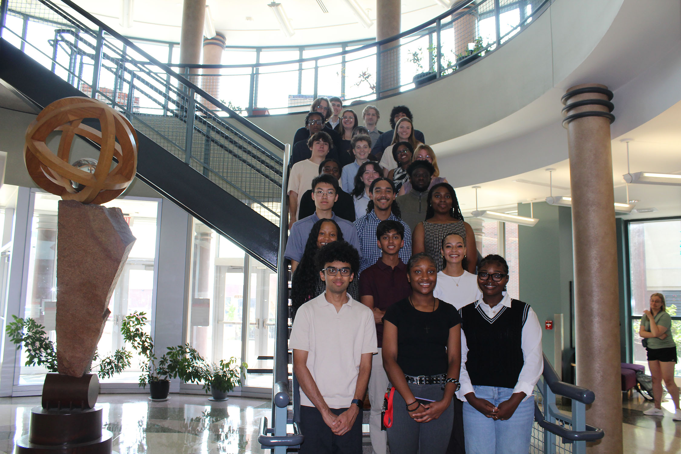Group photo of the 2025 Summer of Inquiry Symposium participants